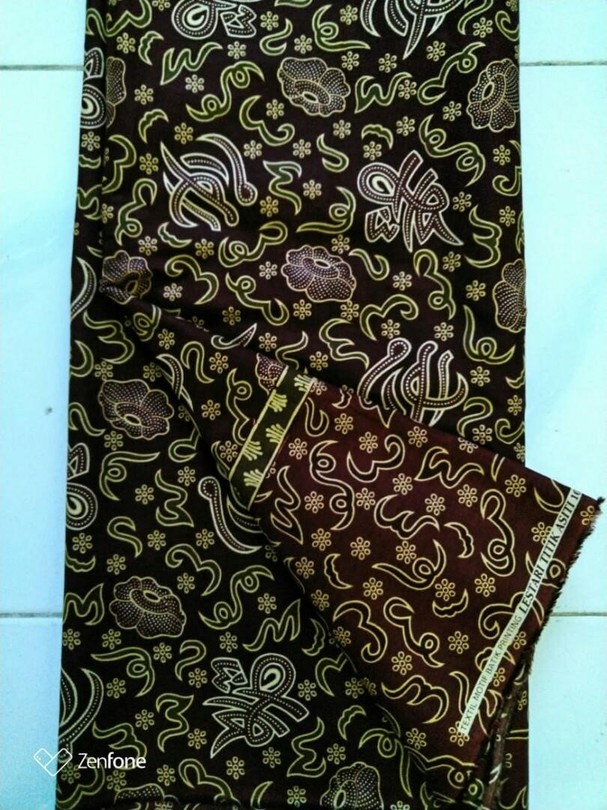 pakaian adat bengkulu kain besurek motif kaligrafi