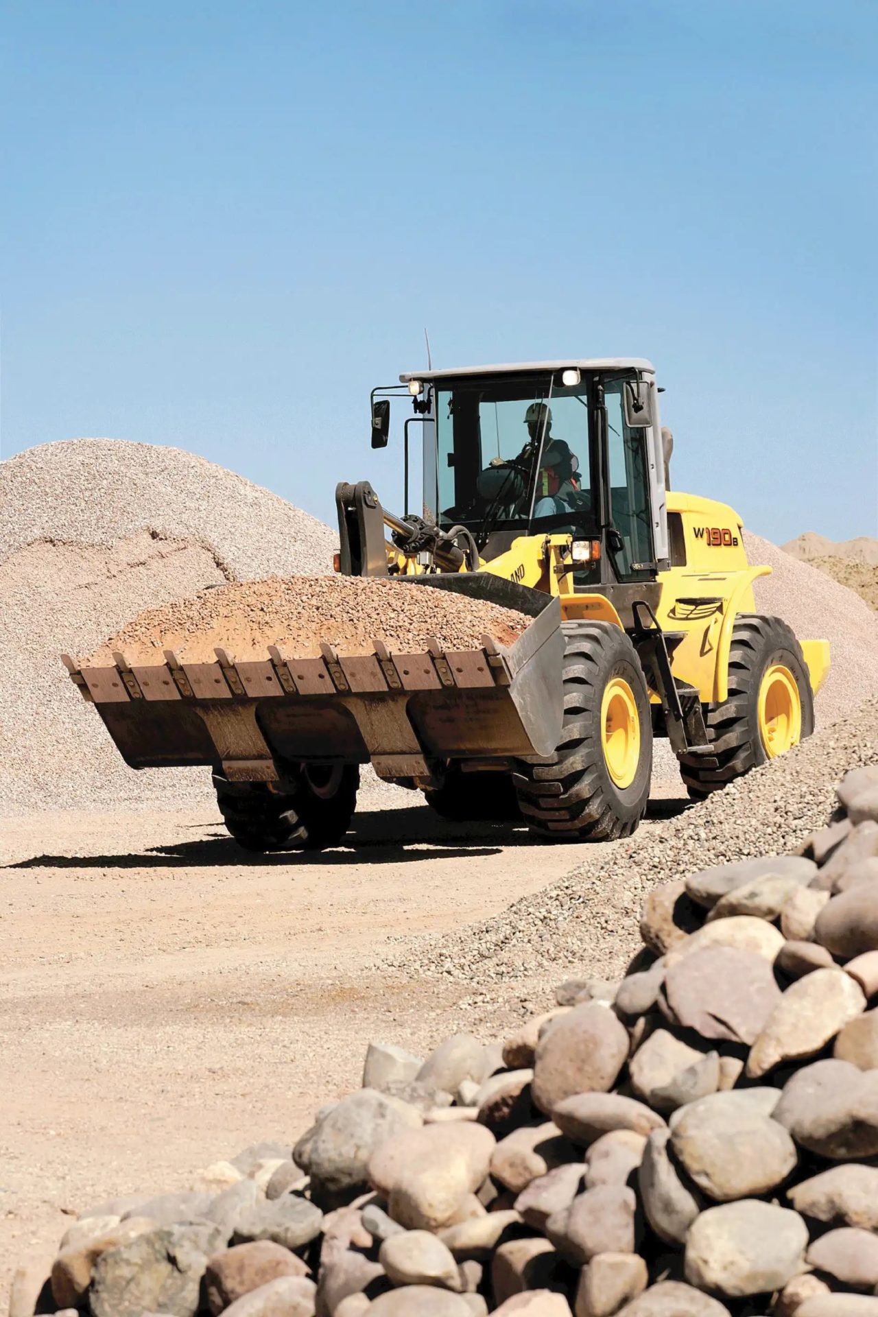 jenis alat berat wheel loader dan fungsinya